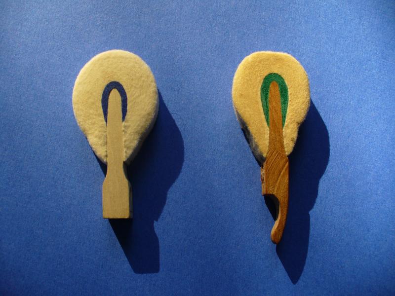 Voicing piano hammers showing a  good hammer and a flat hammer